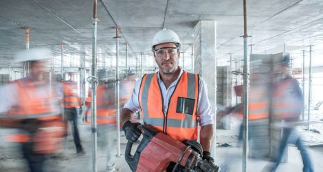 mid-adult-male-builder-holding-building-equipment-2024-06-14-18-24-15-utc.jpg